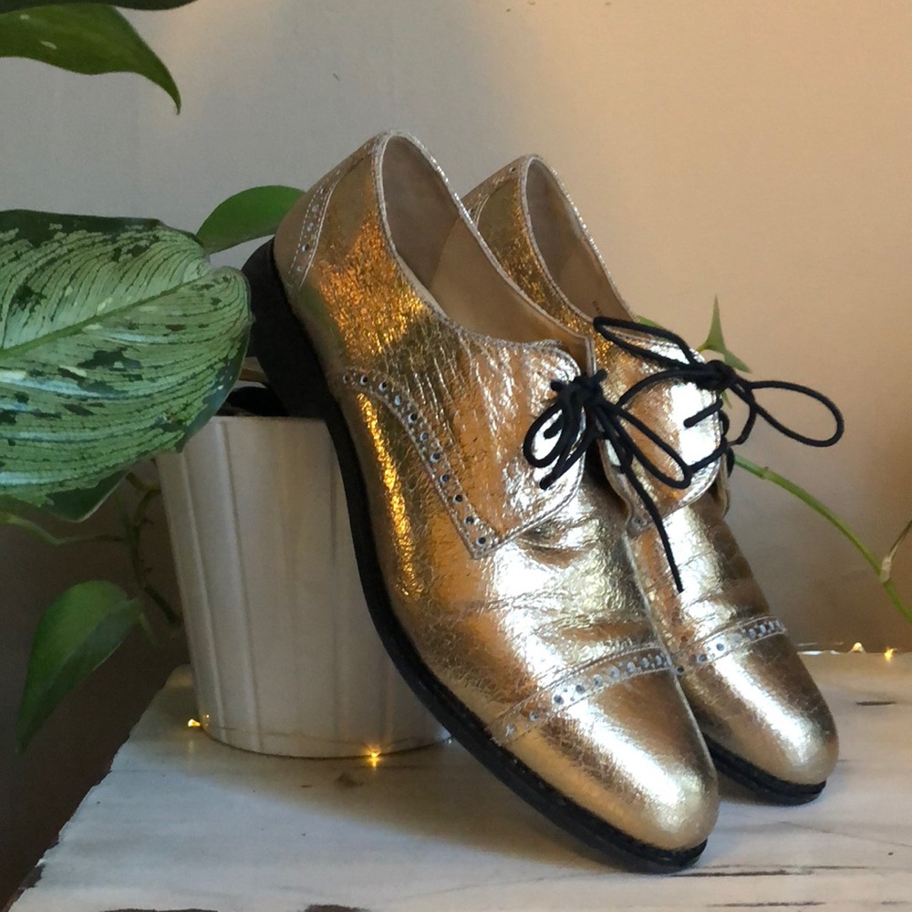 Like-new gold leather Cole Haan oxfords